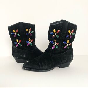 J Bar J black suede cowgirl boots with floral rhinestones on the shaft.